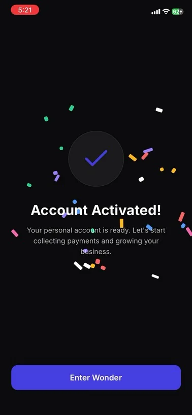 Account activation confirmation screen showing a checkmark and an Enter Wonder button